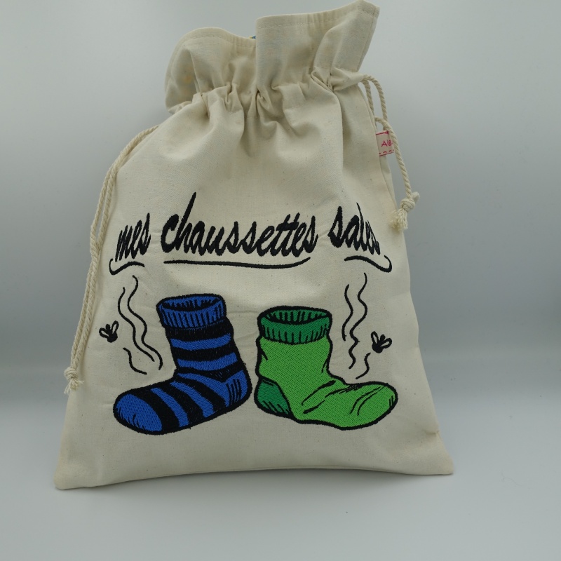 pochon à chaussettes sales en vert et bleu