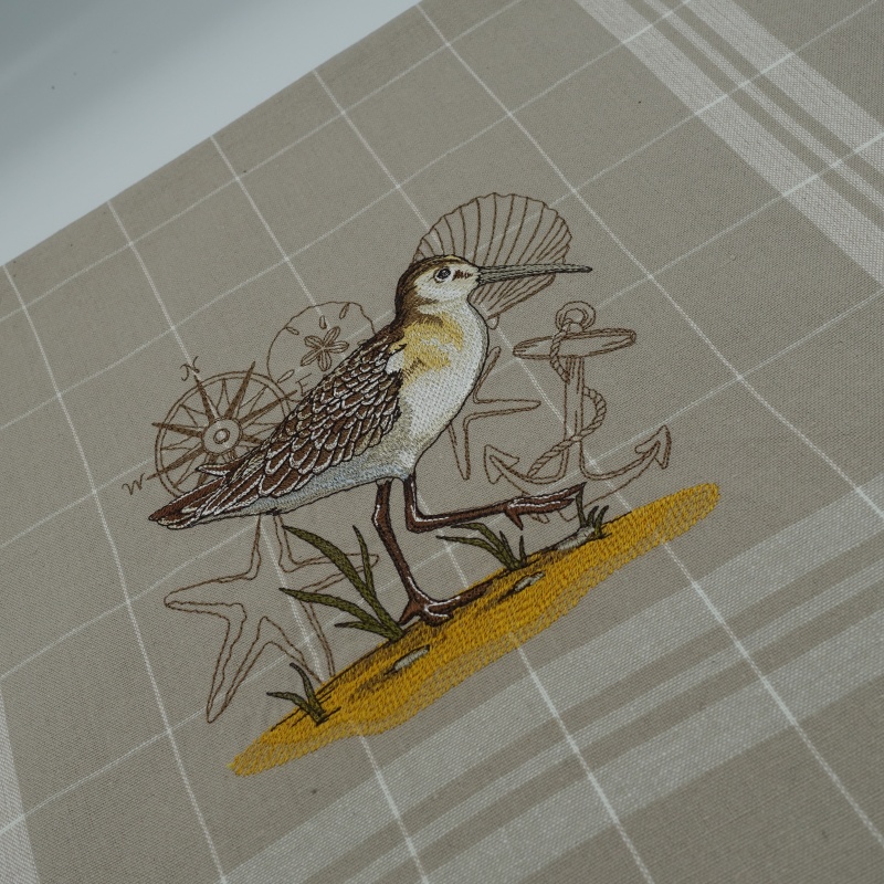 torchon brodé beige motif mouette