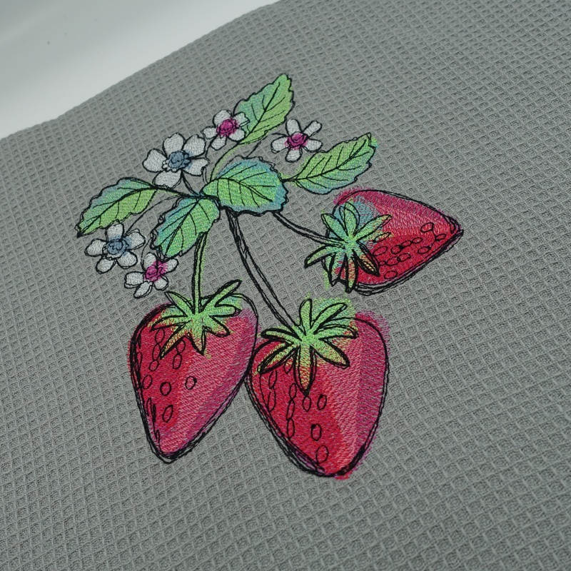 torchon brodé gris motif fraises