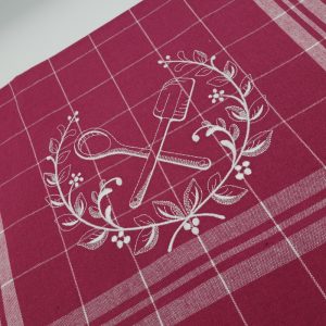 Torchon brodé rose/prune