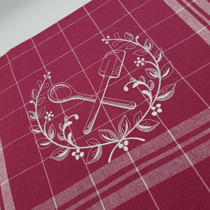 torchon brodé rose prune motif spatules