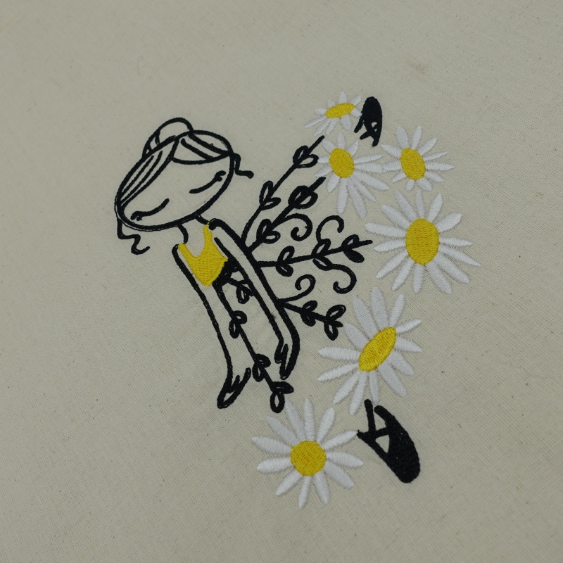 tote bag brodé danseuse robe avec des marguerites en gros plan